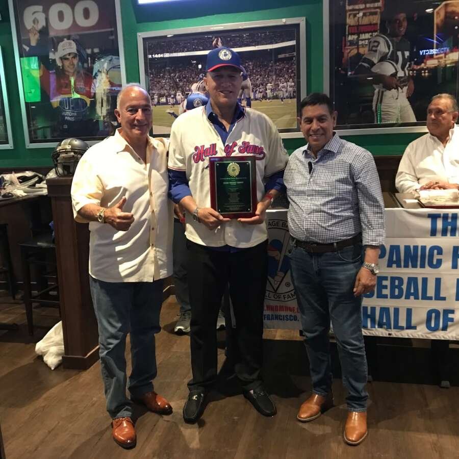 Orlando Rodriguez HHBMHOF aficionado with Julian Tavares at the induction into the Hispanic Heritage Baseball Museum Hall of Fame at Duffy's South Miami Florida and Tito Avila